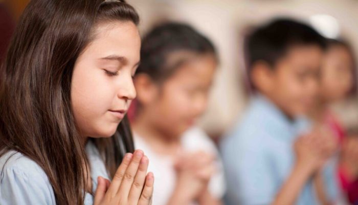 Analysis reveals divided views on teacher-led prayer in public schools in Washington vs. Idaho